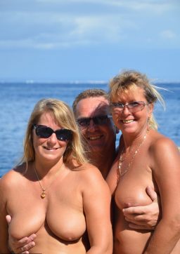 Two blonde women with saggy tits enjoy hot suck and fuck in beach threesome