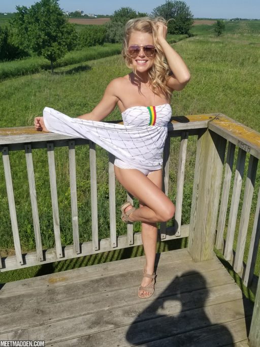 Blonde bombshell with sunglasses Meet Madden sunbathing topless in the nature